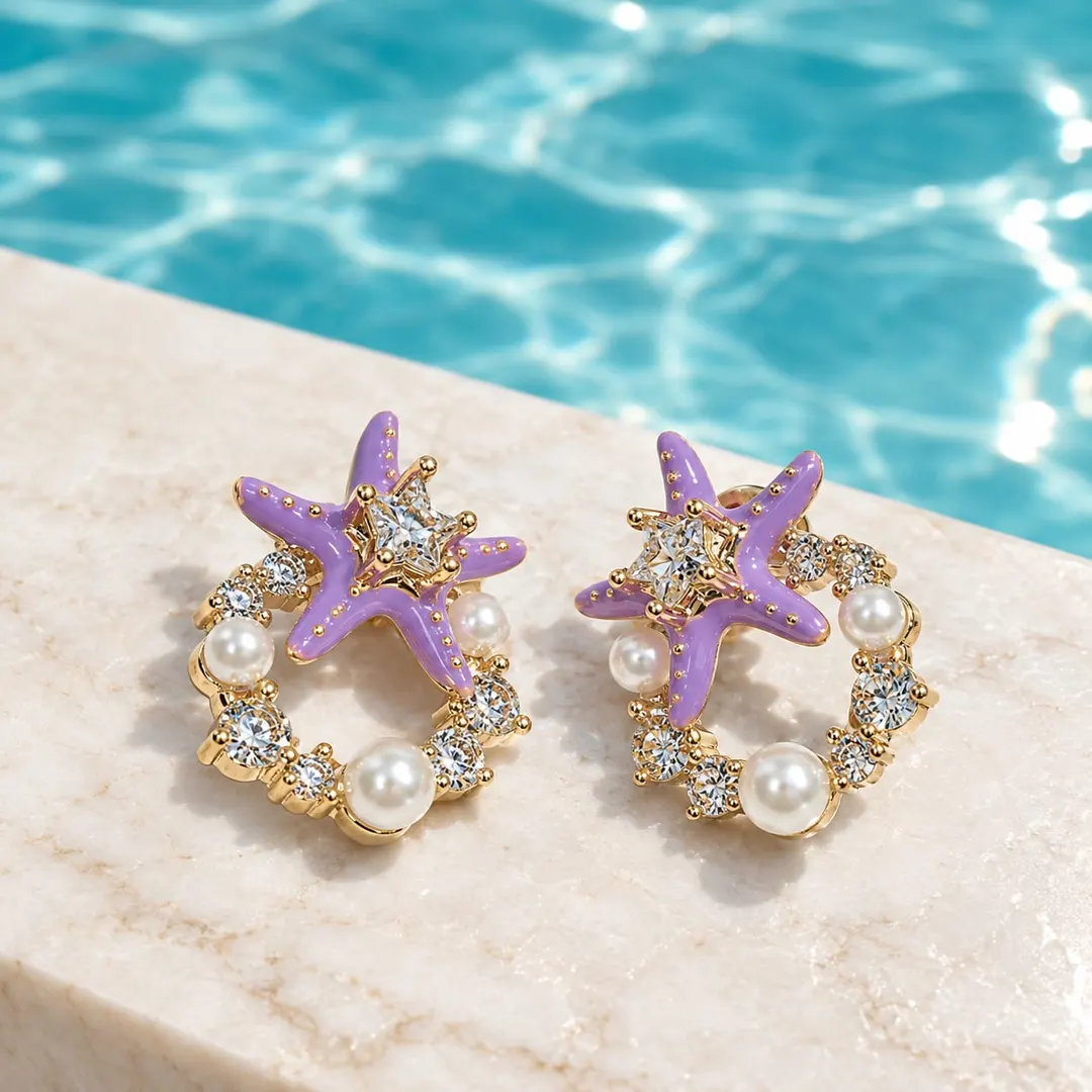 PURPLE STARFISH EARRING WITH RHINSTONE DETAILING 