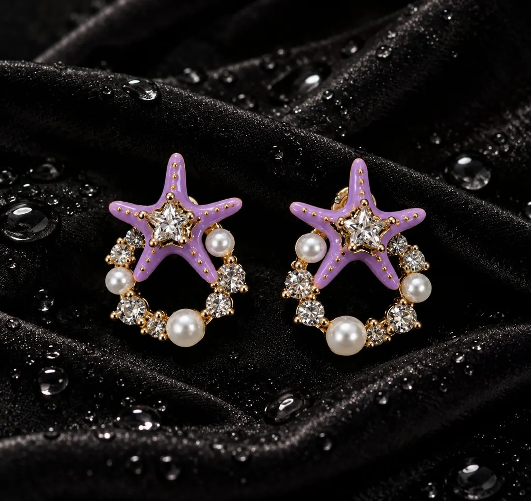 PURPLE STARFISH EARRING WITH RHINSTONE DETAILING 