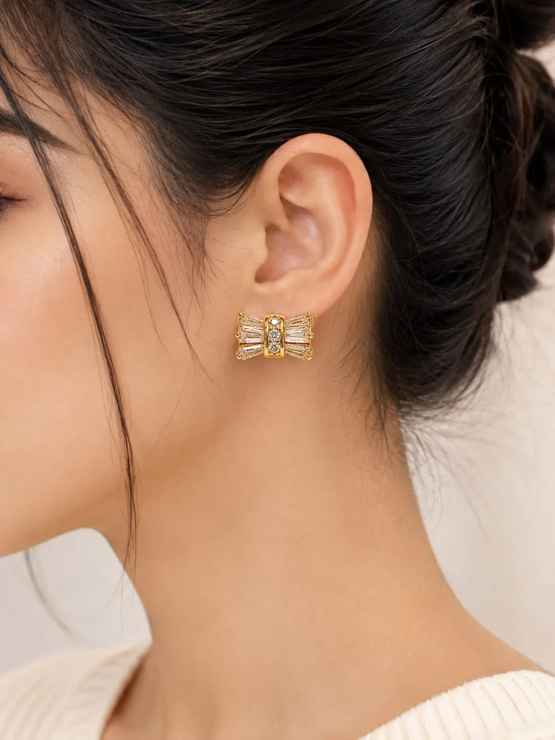GOLDEN CRYSTAL BOW STUD EARRINGS