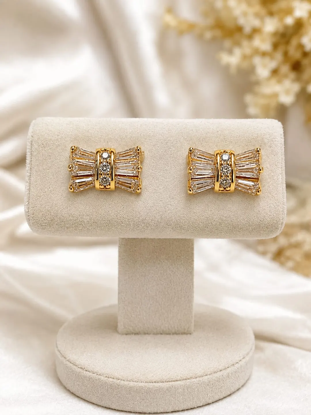 GOLDEN CRYSTAL BOW STUD EARRINGS