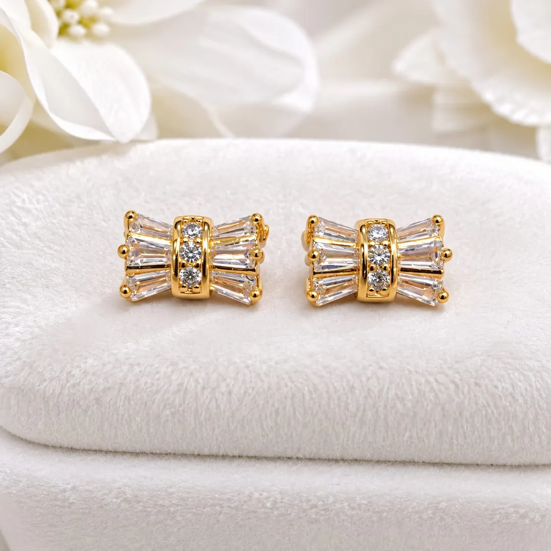 GOLDEN CRYSTAL BOW STUD EARRINGS