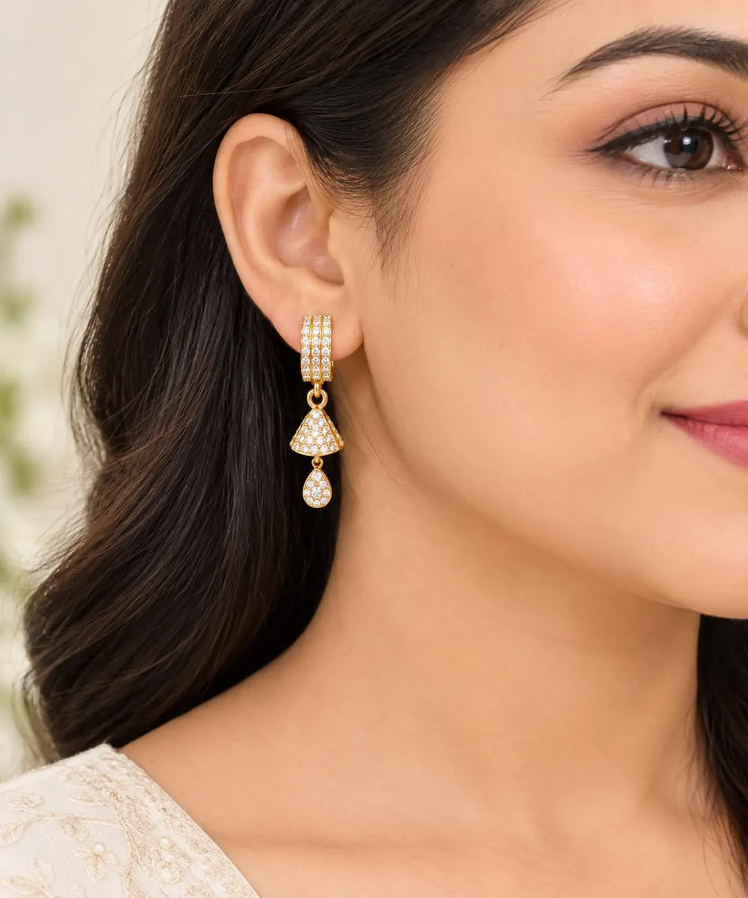 GOLD-PLATED CZ STUDDED GEOMETRIC DROP EARRINGS.