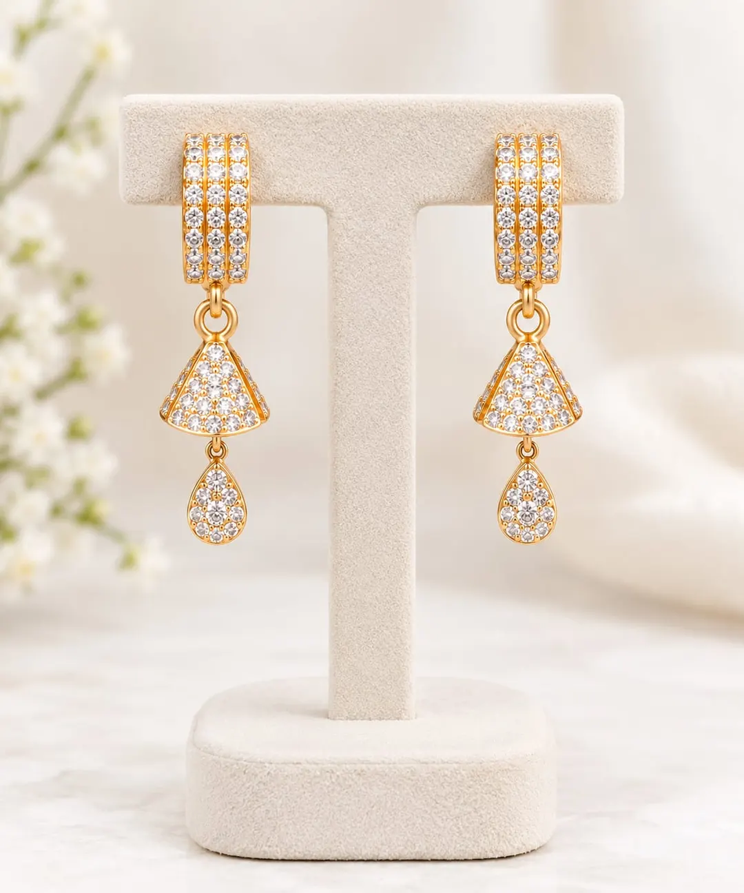 GOLD-PLATED CZ STUDDED GEOMETRIC DROP EARRINGS.