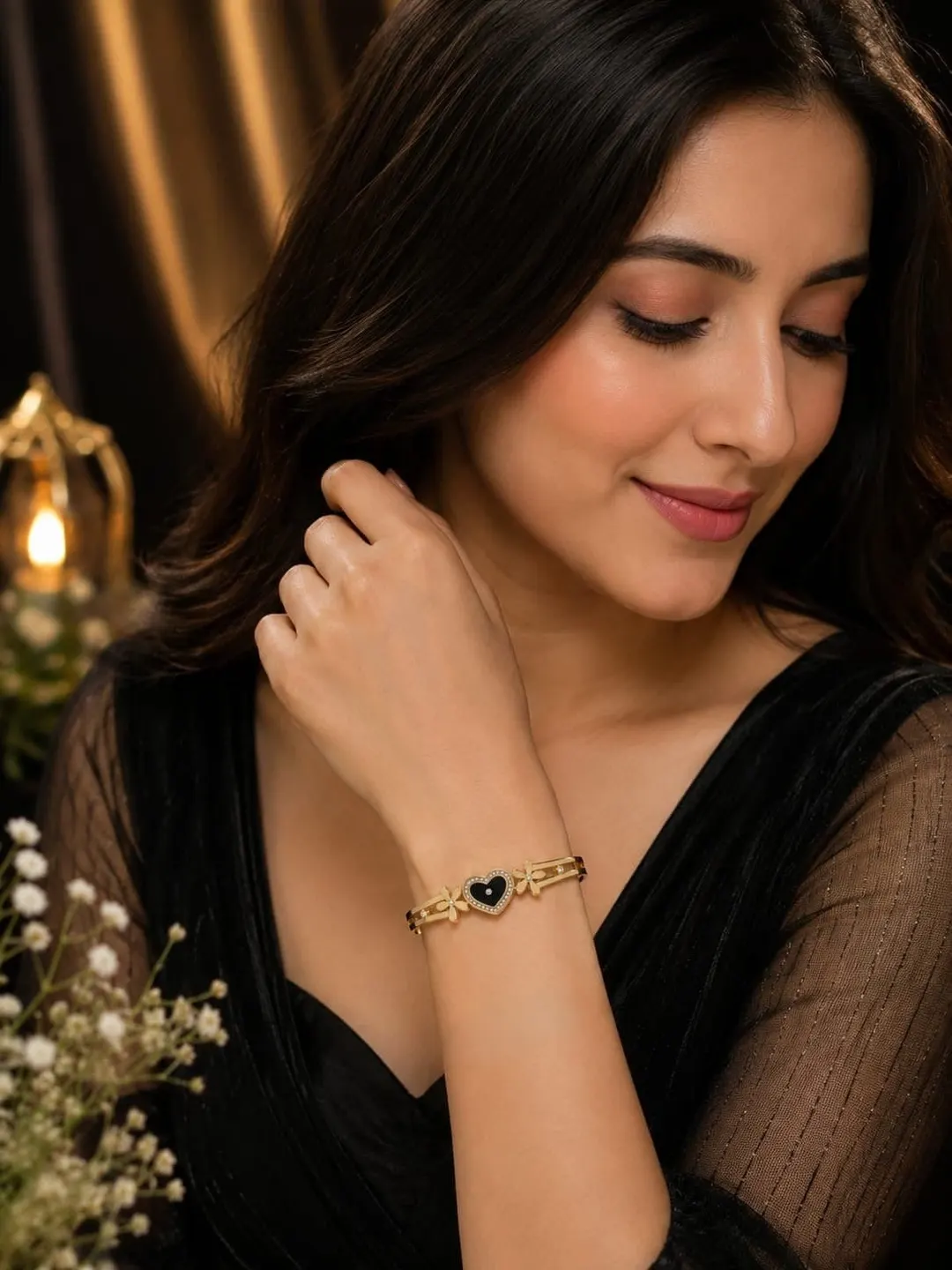GOLD-PLATED BLACK HEART AND FLORAL BRACELET