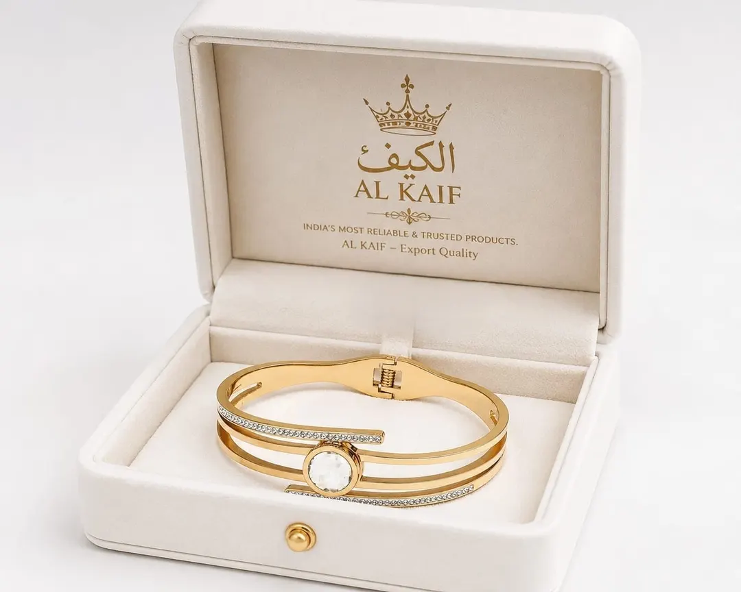 ROSE GOLD CRYSTAL WRAP BRACELET FEATURE SPLIT BAND DESIGN AND SPARKLING CENTER CRYSTAL DIAMOND.