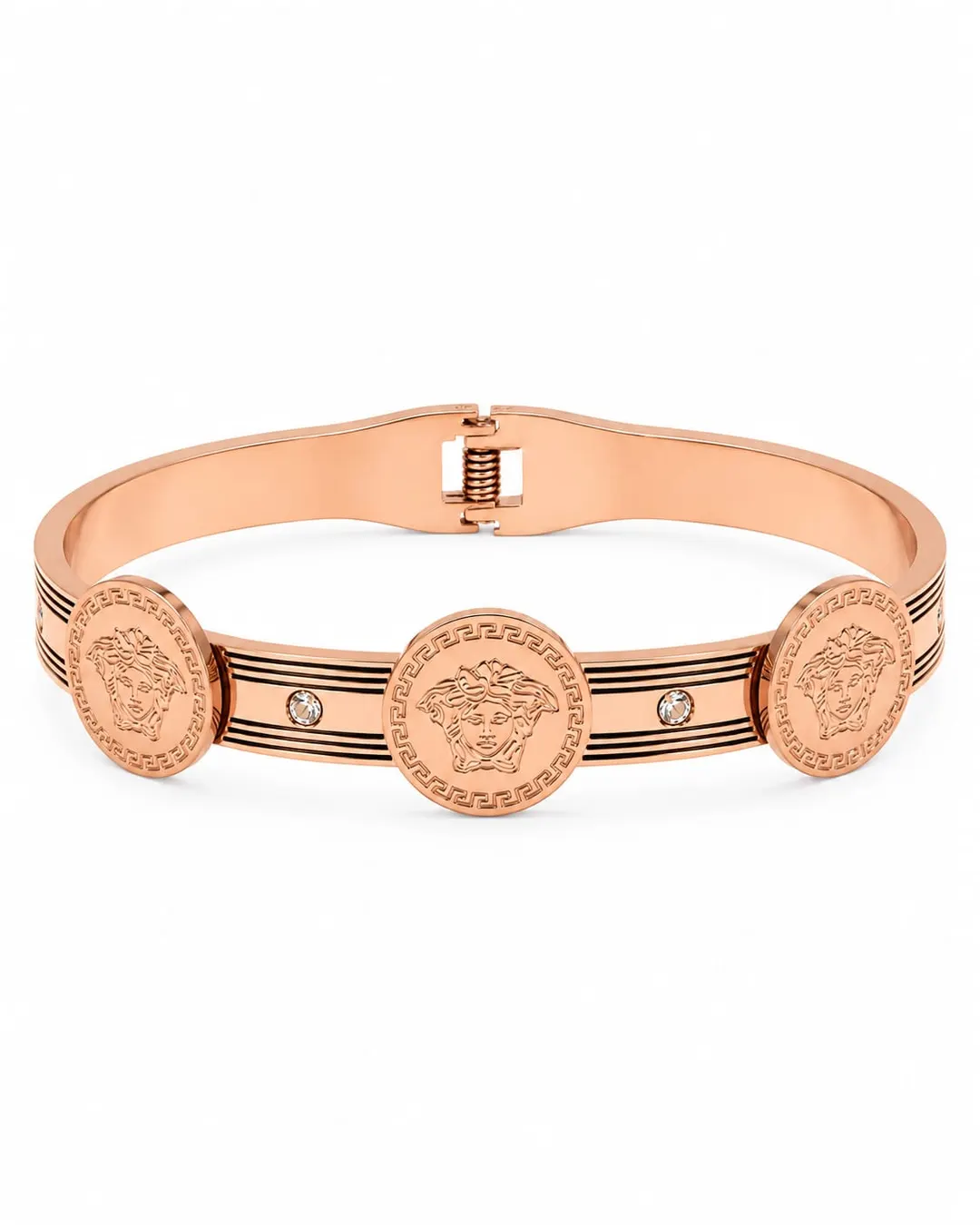 STRIKING ROSE GOLD TONE FINISH ACCENTED WITH SIGNATURE MEDUSA COIN MEDALLIONS, CRYSTAL EMBELLISHMENTS AND A CONVENIENT HINGED CLOSURE.