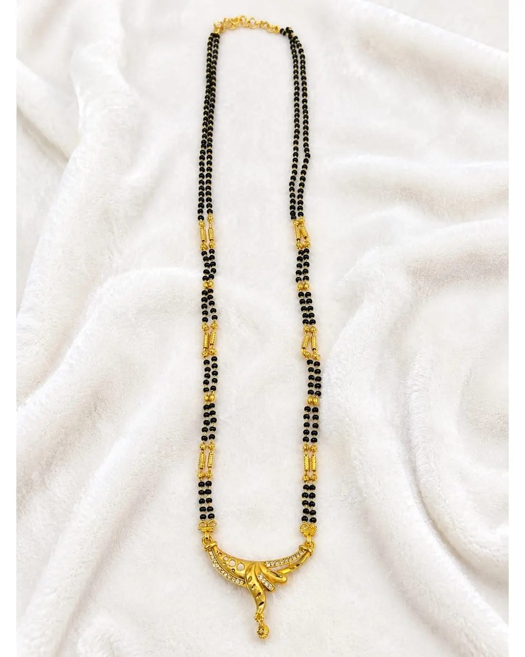 TRADITIONAL GOLD-PLATED DOUBLE-LINE BLACK BEADS MANGALSUTRA WITH DESIGNER PENDANT