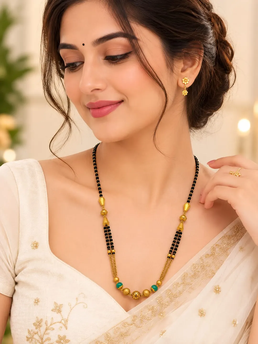 TRADITIONAL GOLD-TONE BLACK BEADED MANGALSUTRA WITH GREEN BEAD ACCENTS