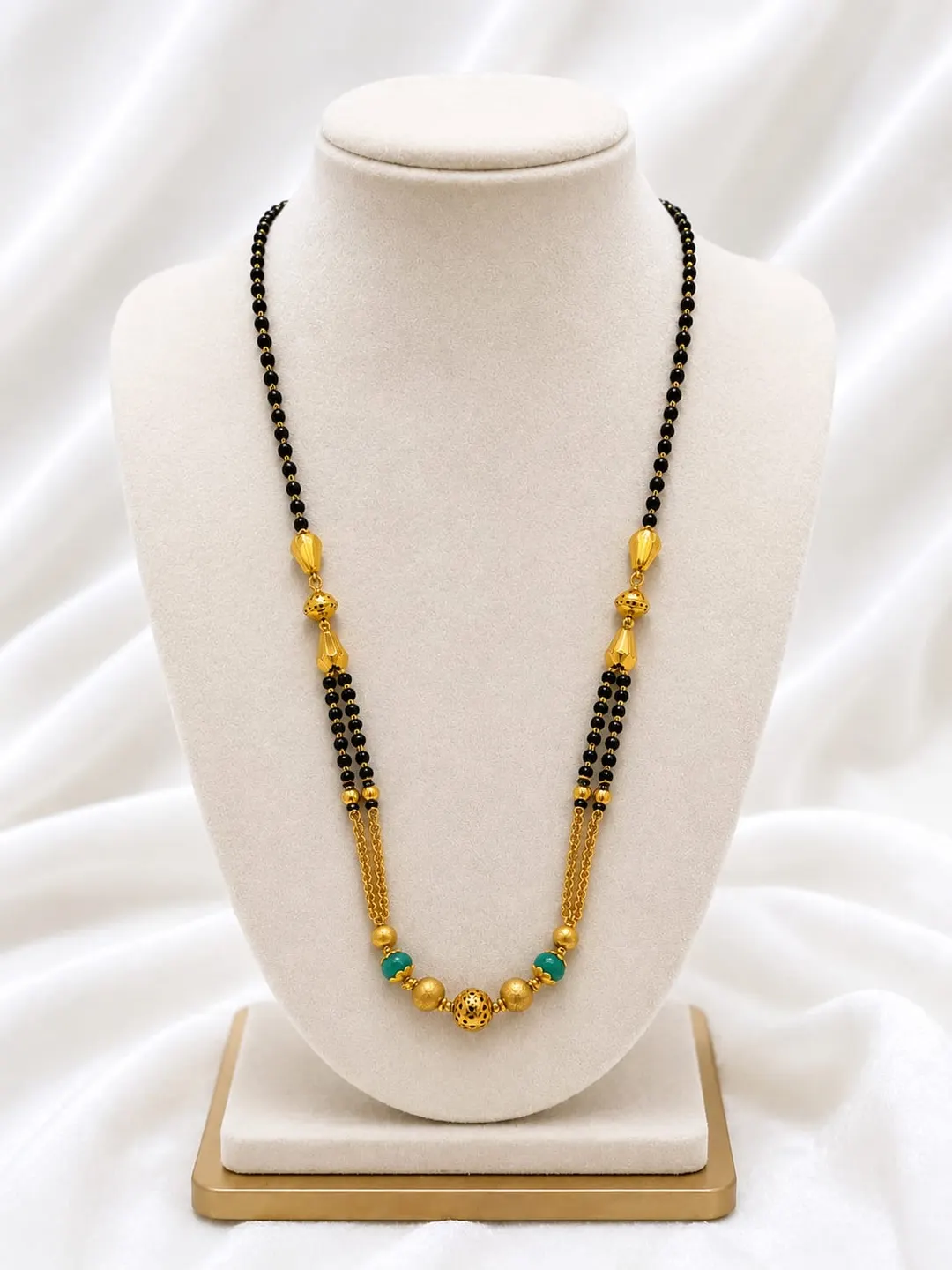 TRADITIONAL GOLD-TONE BLACK BEADED MANGALSUTRA WITH GREEN BEAD ACCENTS