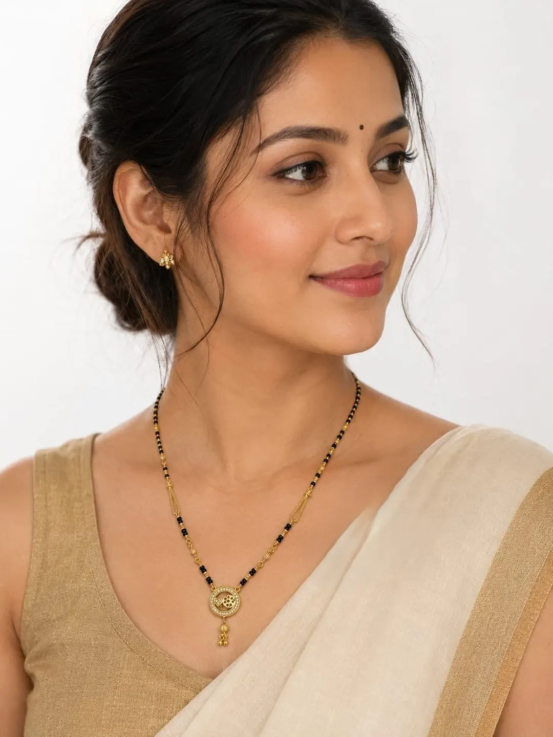 ELEGANT GOLD-TONED BLACK BEADED MANGALSUTRA NECKLACE ITH FLORAL ROUND PENDANT