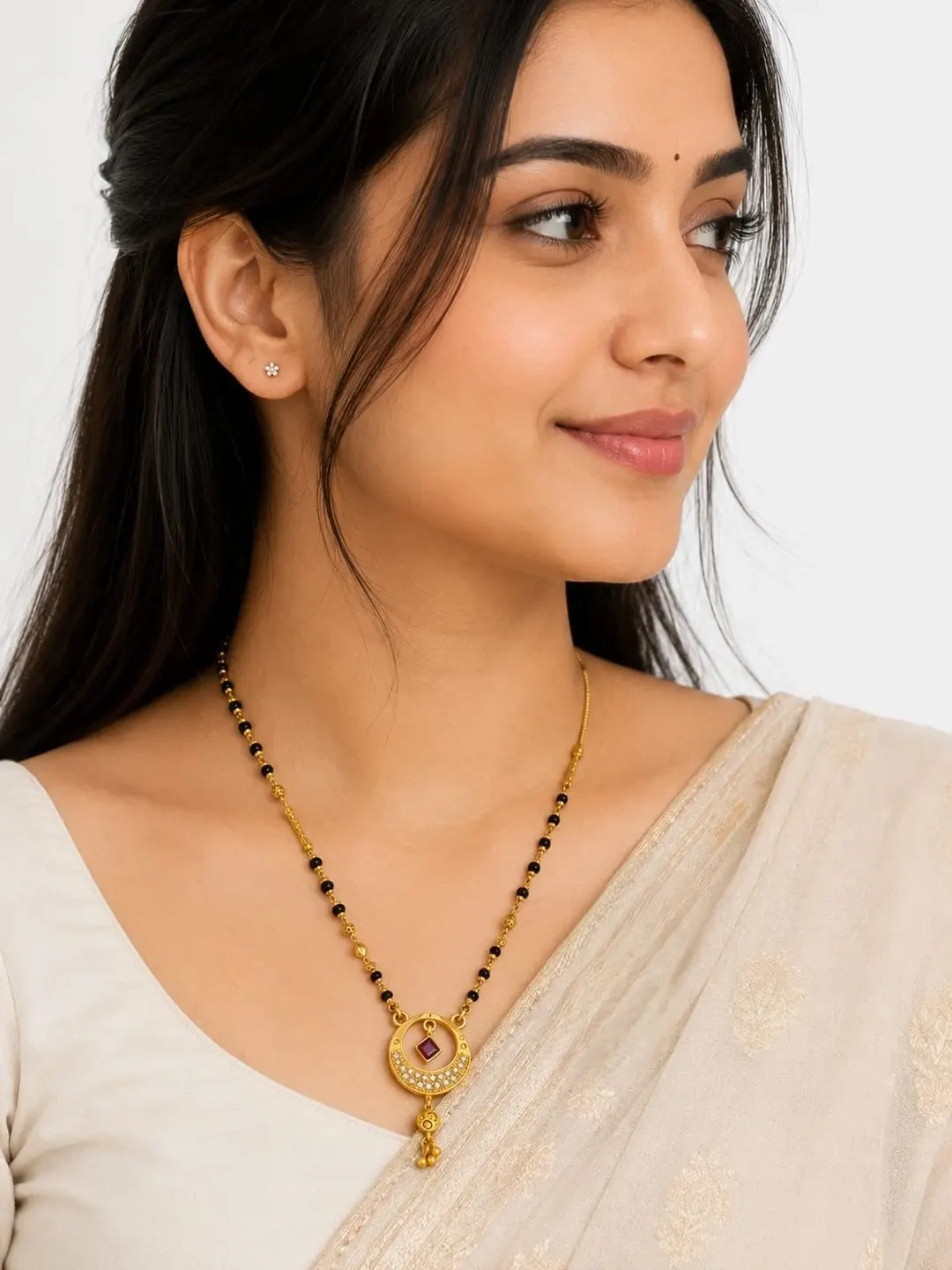 ELEGANT GOLD-TONE BLACK BEADED MANGALSUTRA WITH RED STONE PENDANT
