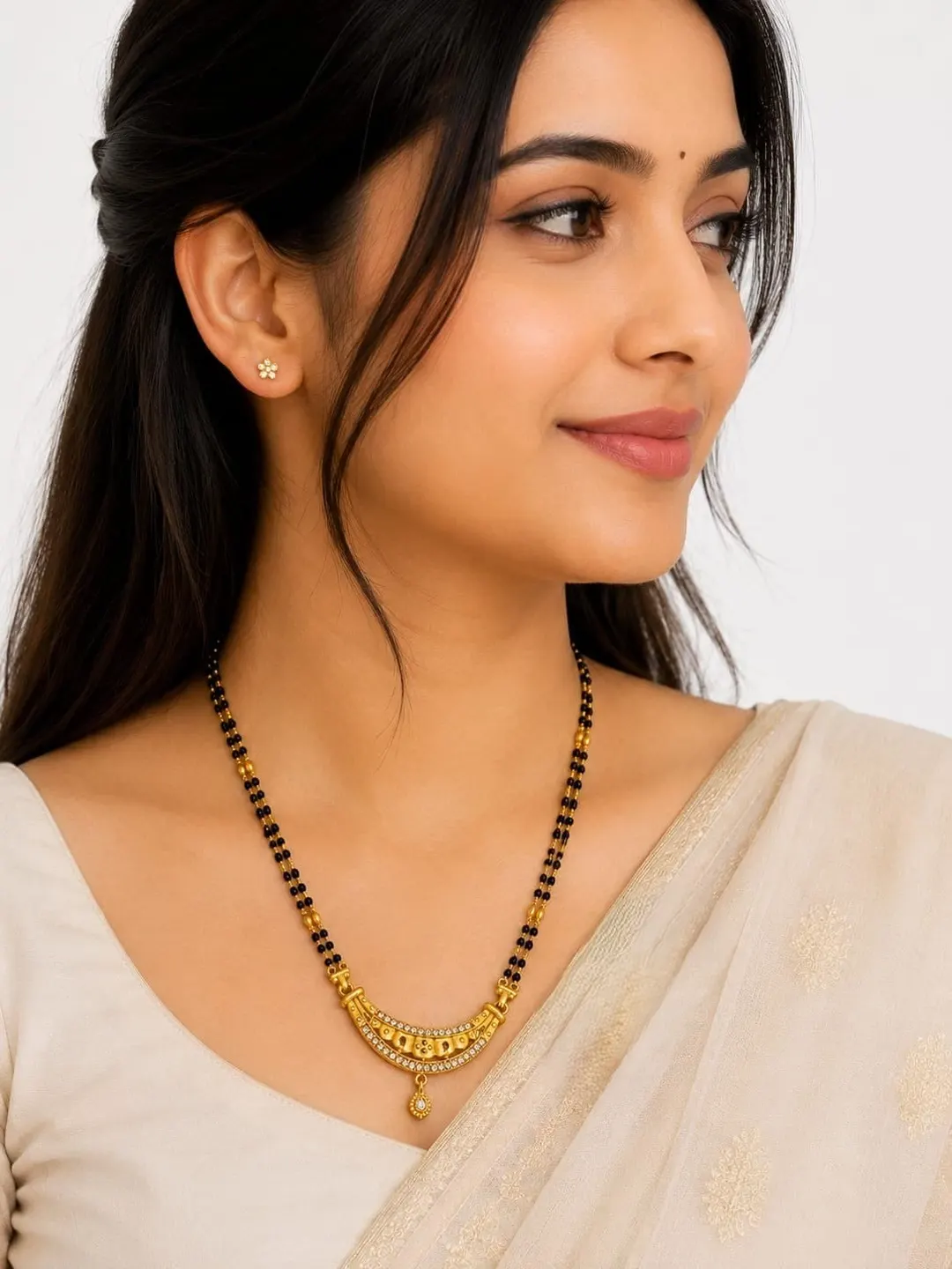 ELEGANT GOLD-TONE DOUBLE-LINE BLACK BEADED MANGALSUTRA WITH TRADITIONAL CRESCENT PENDANT