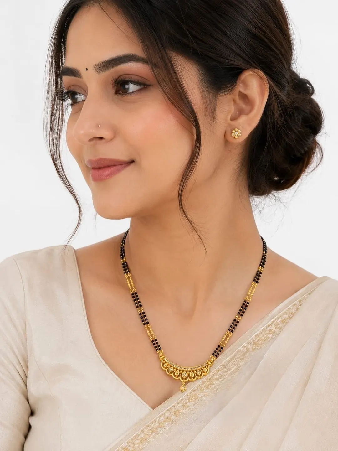 ELEGANT GOLD-TONE DOUBLE-LINE BLACK BEADED MANGALSUTRA WITH DESIGNER FLORAL PENDANT