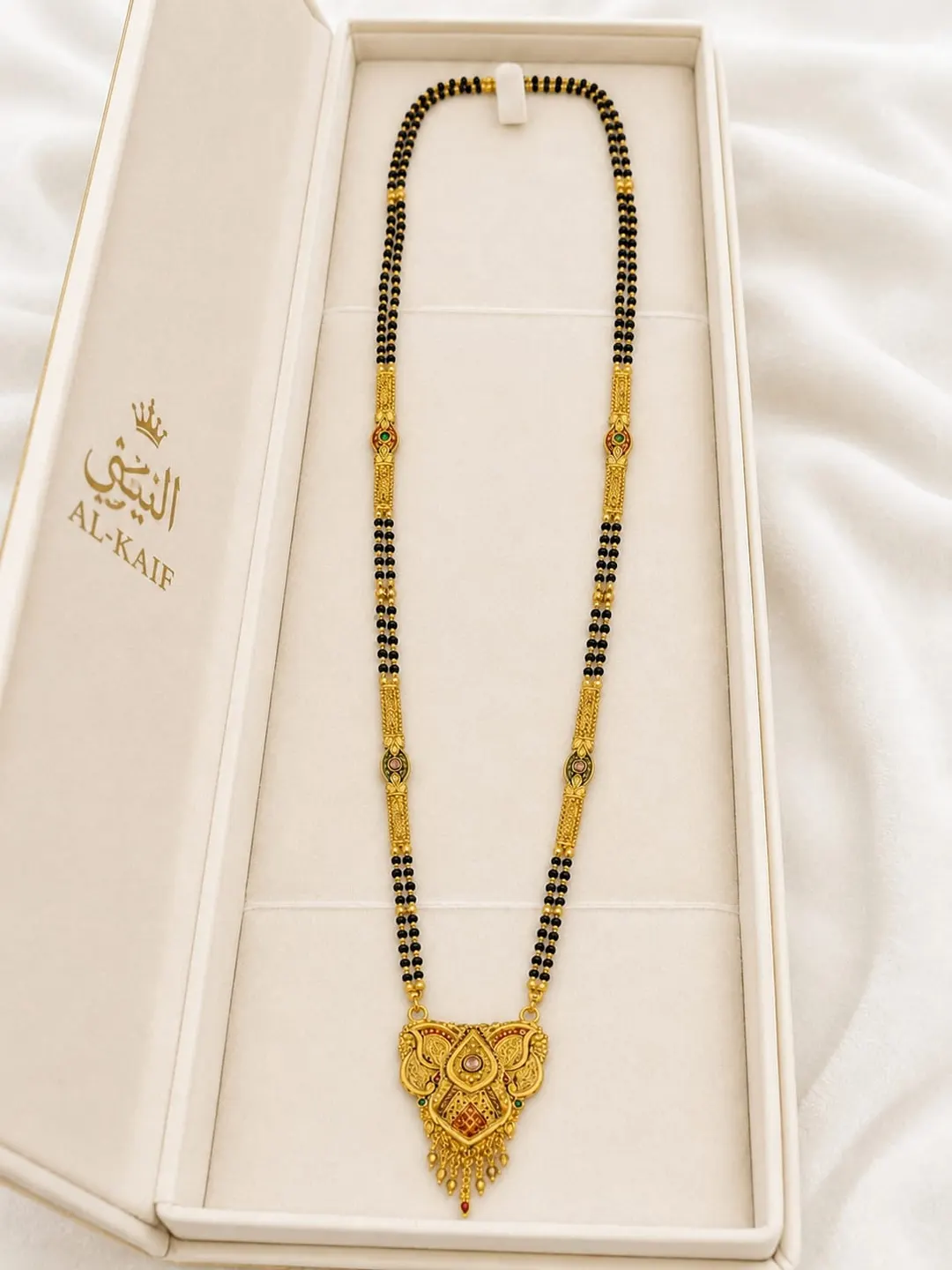 TRADITIONAL GOLD-TONE BLACK BEADED MANGALSUTRA WITH ANTIQUE PENDANT