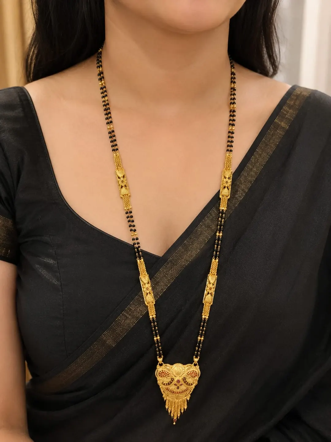 TRADITIONAL GOLD-PLATED DOUBLE-LINE BLACK BEAD MANGALSUTRA WITH ORNATE PENDANT