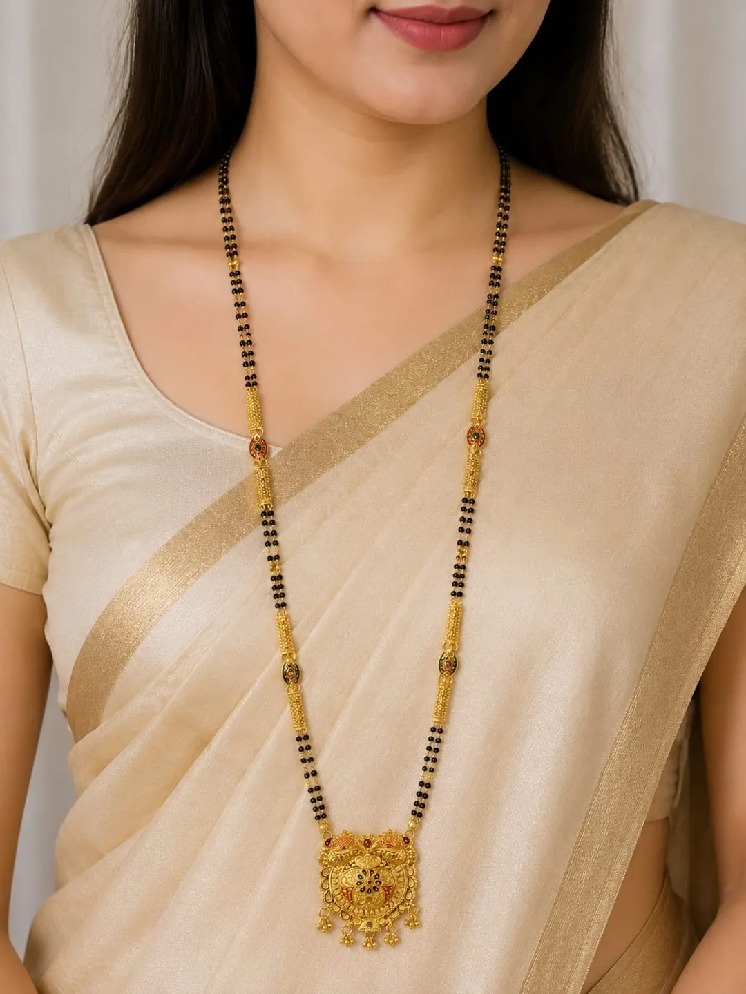 TRADITIONAL GOLD-PLATED DOUBLE-LINE BLACK BEAD MANGALSUTRA WITH FLORAL PENDANT AND DANGLING CHARMS 