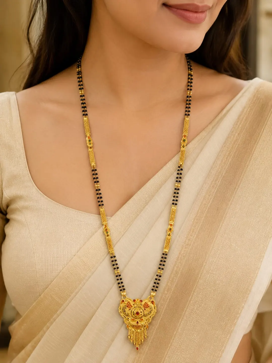 TRADITIONAL GOLD-PLATED DOUBLE-LINE BLACK BEAD MANGALSUTRA  WITH ROYAL DESIGNER PENDANT