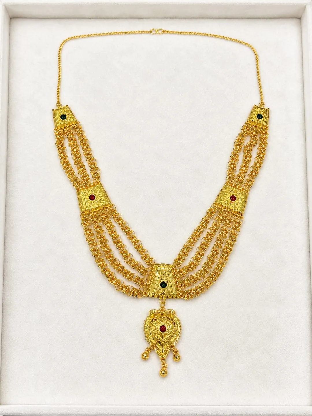 TRADITIONAL GOLD-TONE MULTI-LAYERED RANI HAAR NECKLACE WITH RED & GREEN STONE ACCENTS AND PENDANT