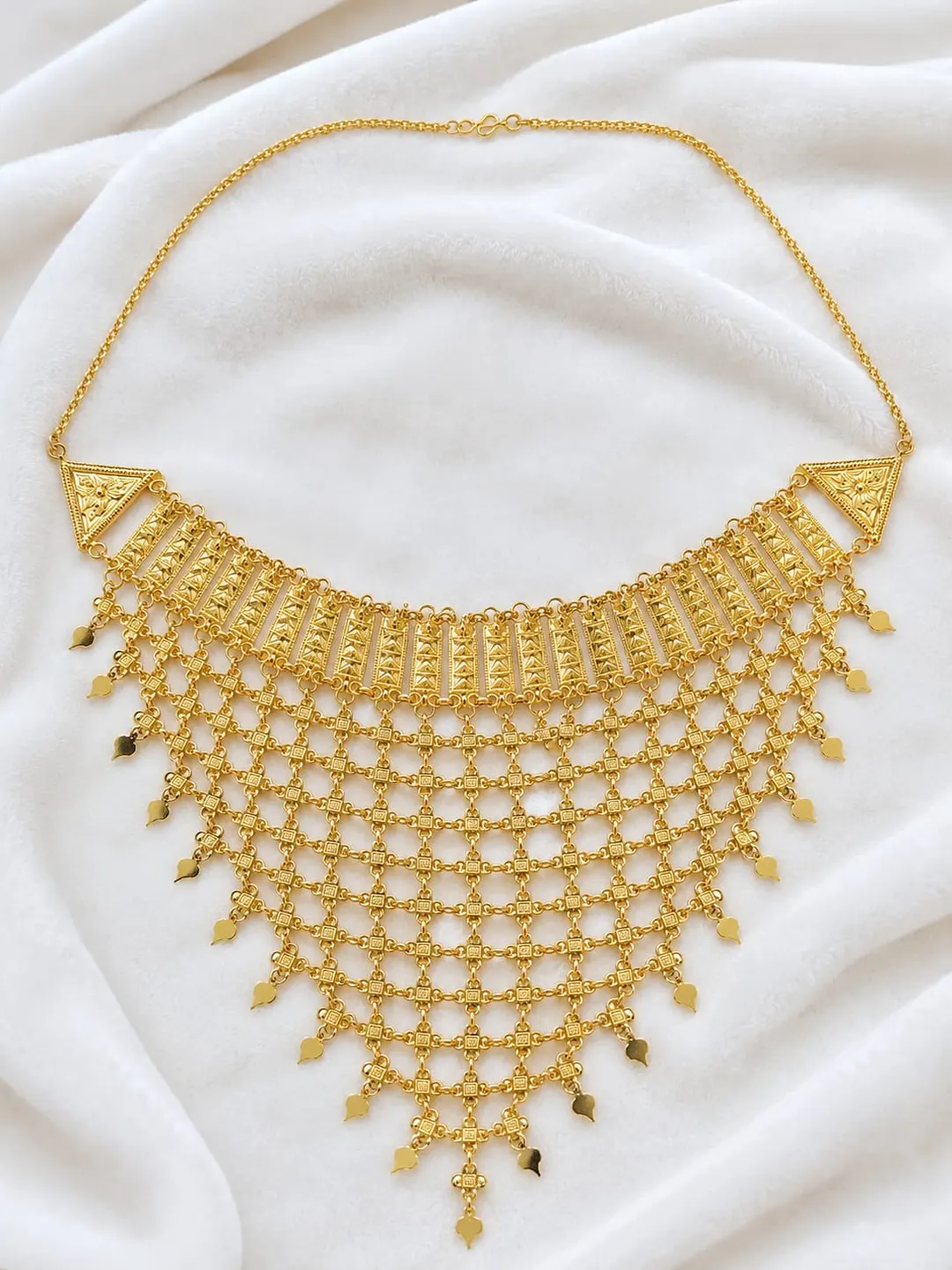 GOLD-TONE MULTI-LAYER JALI NECKLACE WITH LEAF DROPS
