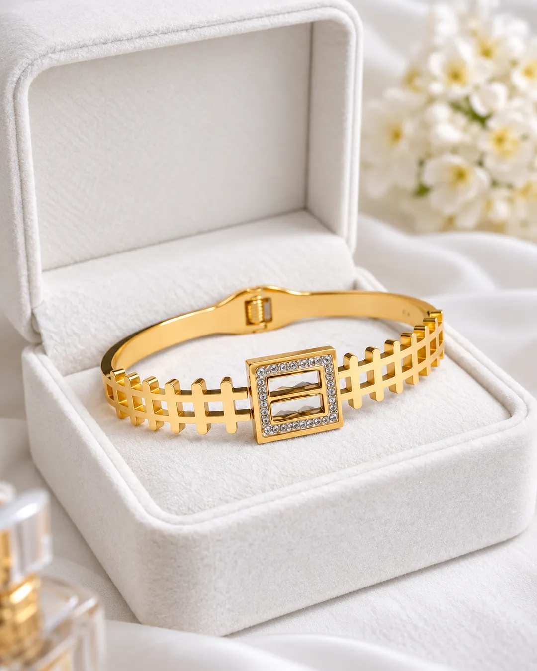 GOLD PLATED GEOMETRIC CRYSTAL BRACELETS AND STRUCTURED CUFFS.
