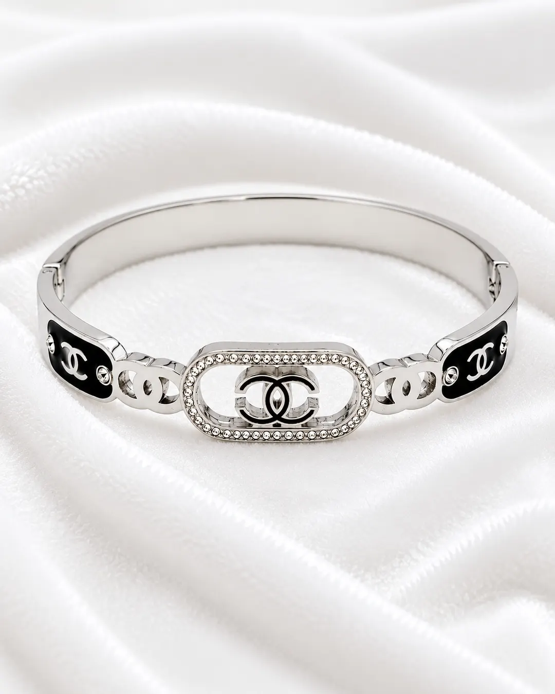 CHANEL INSPIRED ENAMEL & RHINESTONE CC LOGO BRACELET.