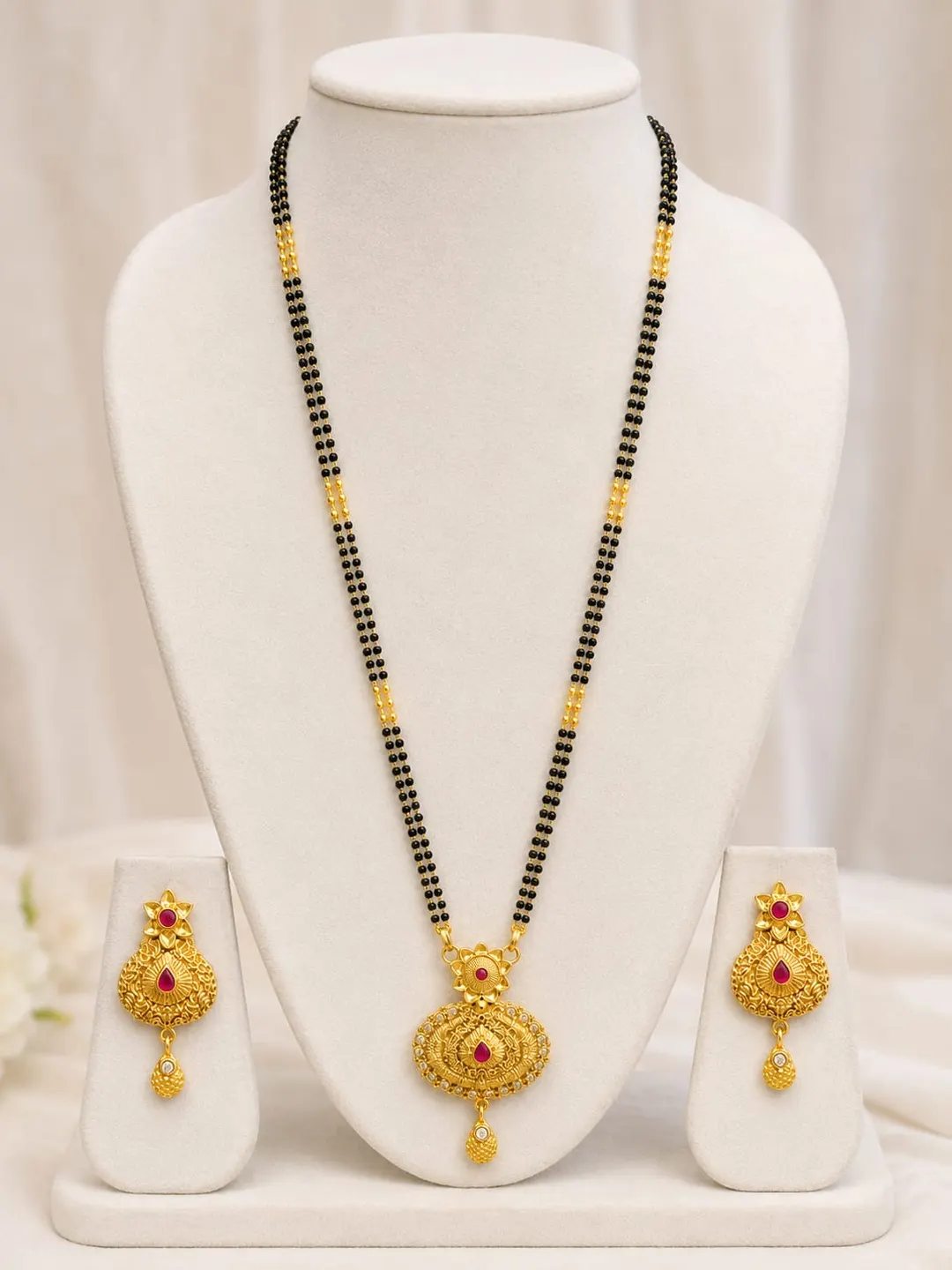 GOLD-TONE BLACK BEADED LONG MANGALSUTRA WITH MATCHING EARRINGS