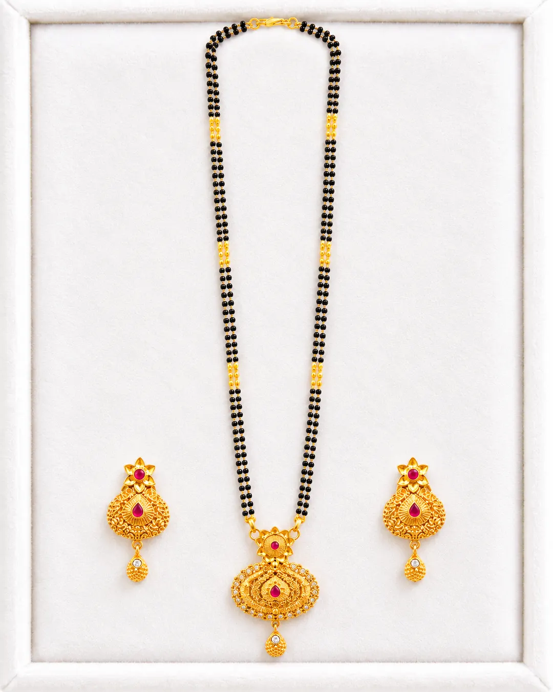 GOLD-TONE BLACK BEADED LONG MANGALSUTRA WITH MATCHING EARRINGS