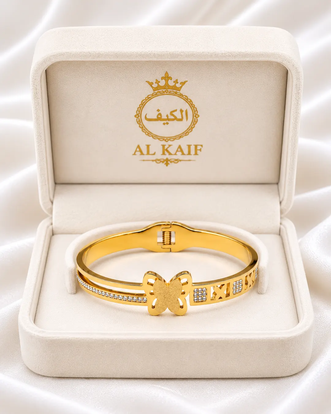GOLD TONE BUTTERFLY MOTIF EMBELLISHED BRACELET.