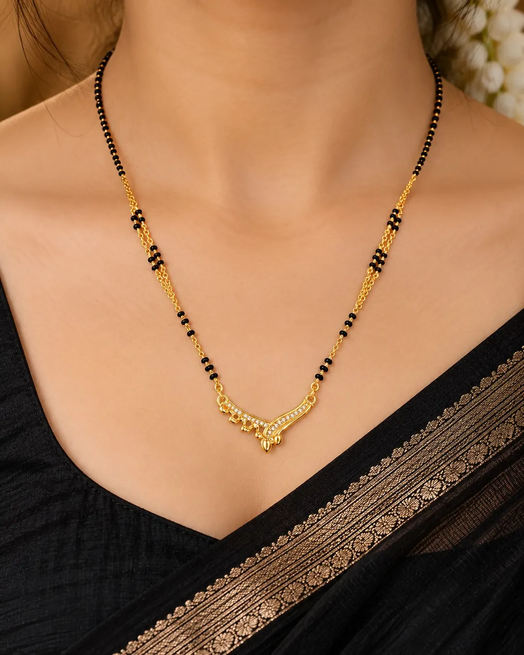 ELEGANT GOLD-TONE BLACK BEADS V-SHAPED AD STONE MANGALSUTRA