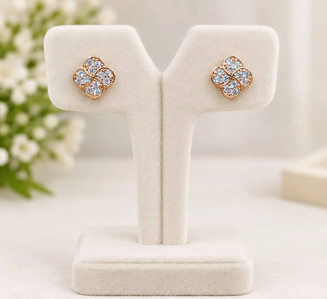 FOUR  PETAL FLORAL CLUSTER STUD EARRINGS.