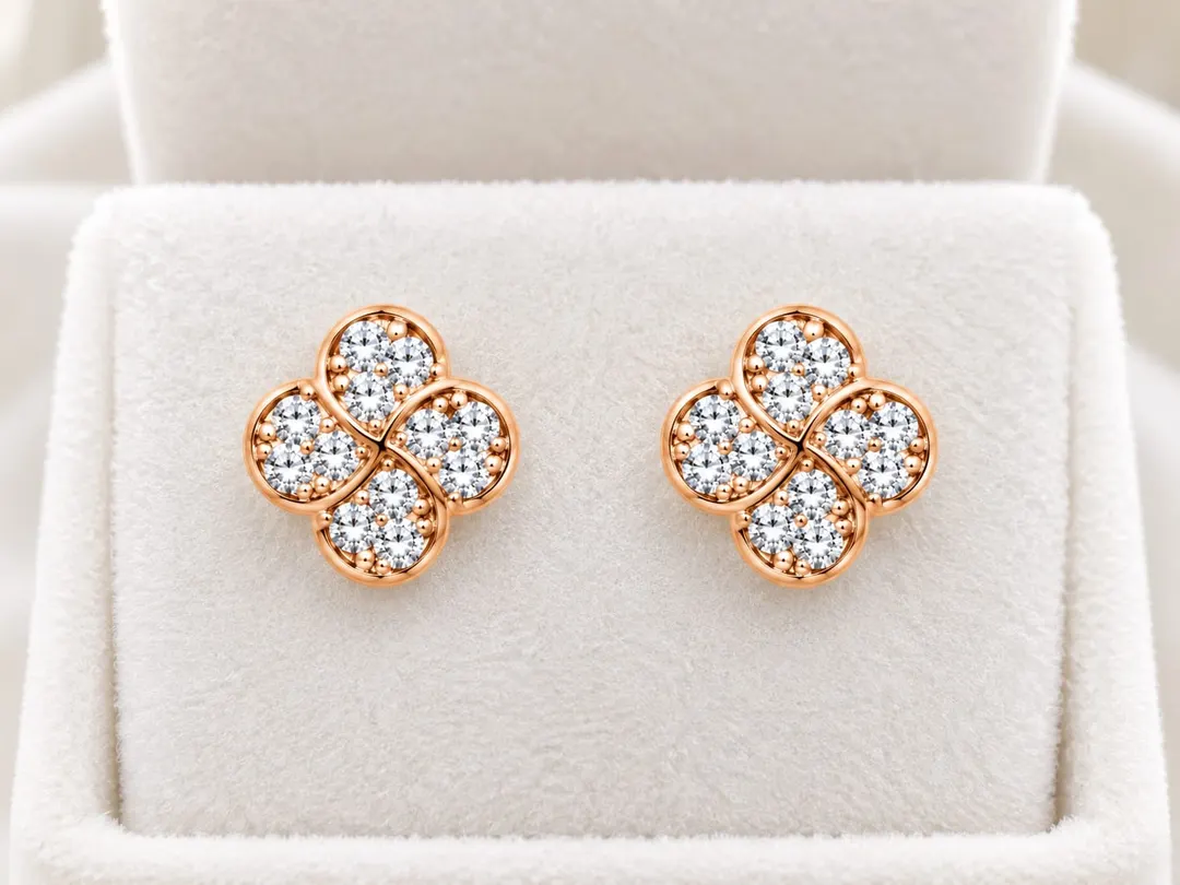 FOUR  PETAL FLORAL CLUSTER STUD EARRINGS.