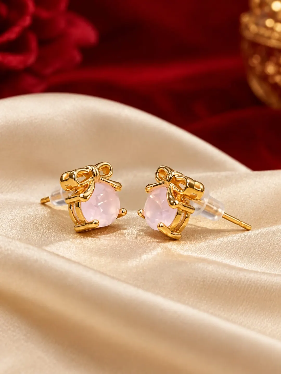 GOLDEN PINK CRYSTAL BOW STUD EARRINGS