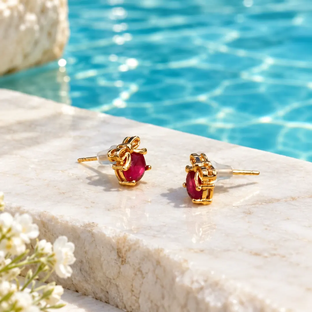 GOLDEN RUBY PINK CRYSTAL BOW STUD EARRINGS