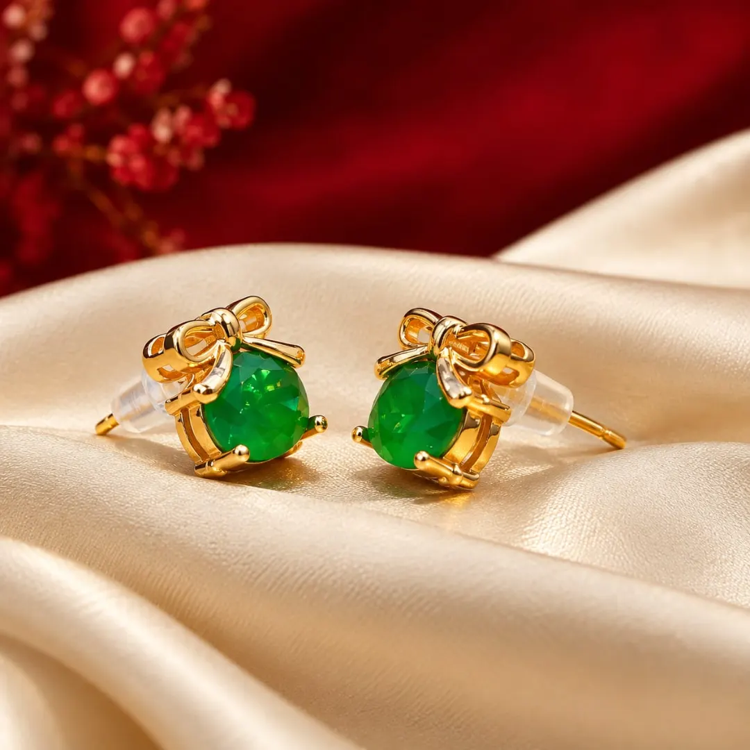 GOLDEN EMERALD GREEN CRYSTAL BOW STUD EARRINGS