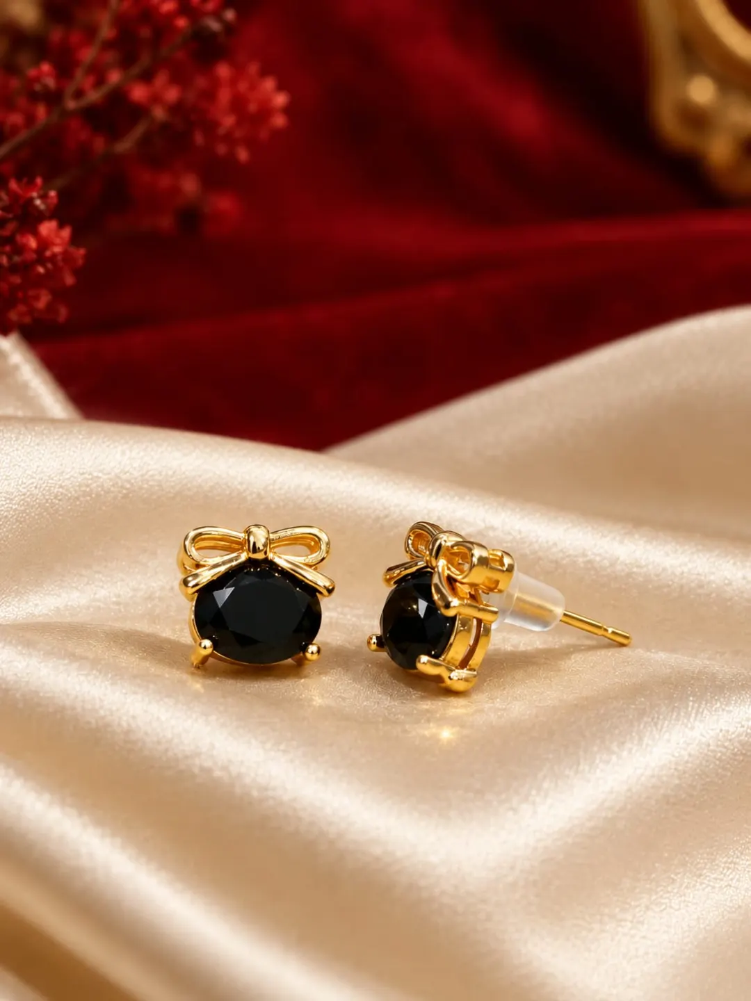 GOLDEN BLACK CRYSTAL BOW STUD EARRINGS