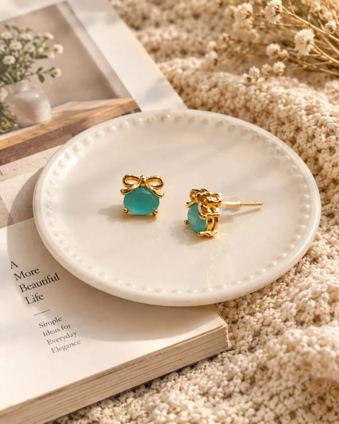 GOLDEN AQUA BLUE CRYSTAL BOW STUD EARRINGS