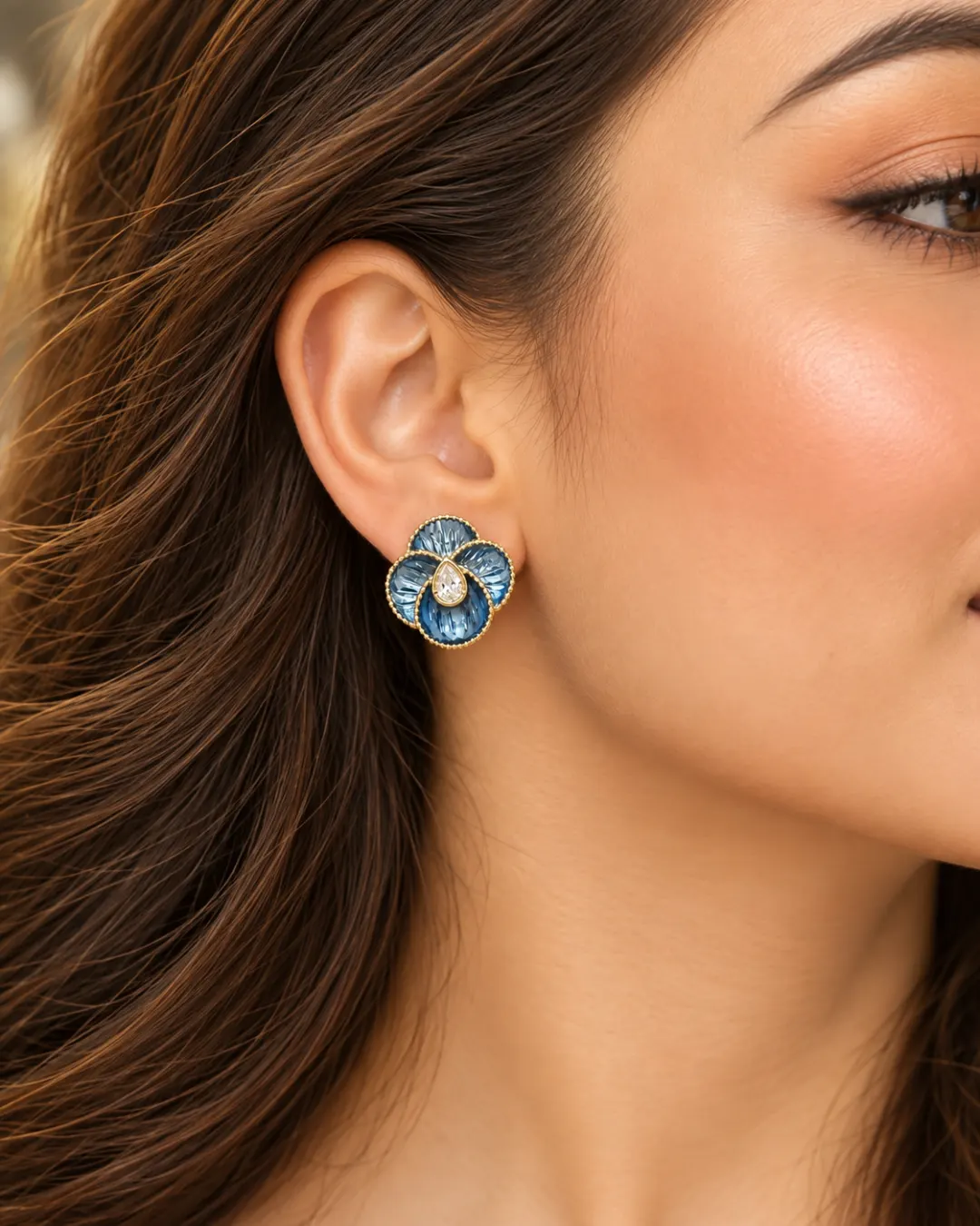 BLUE FLORAL ENAMEL STUD EARRINGS.