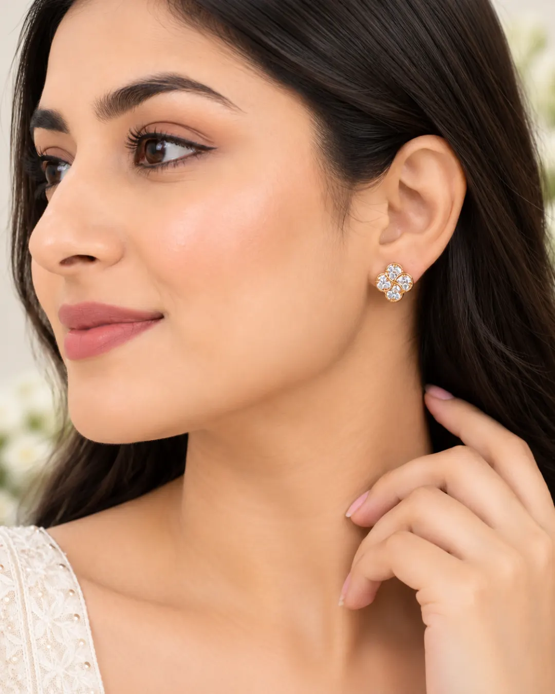 FOUR PETAL FLORAL CLUSTER STUD EARRINGS.