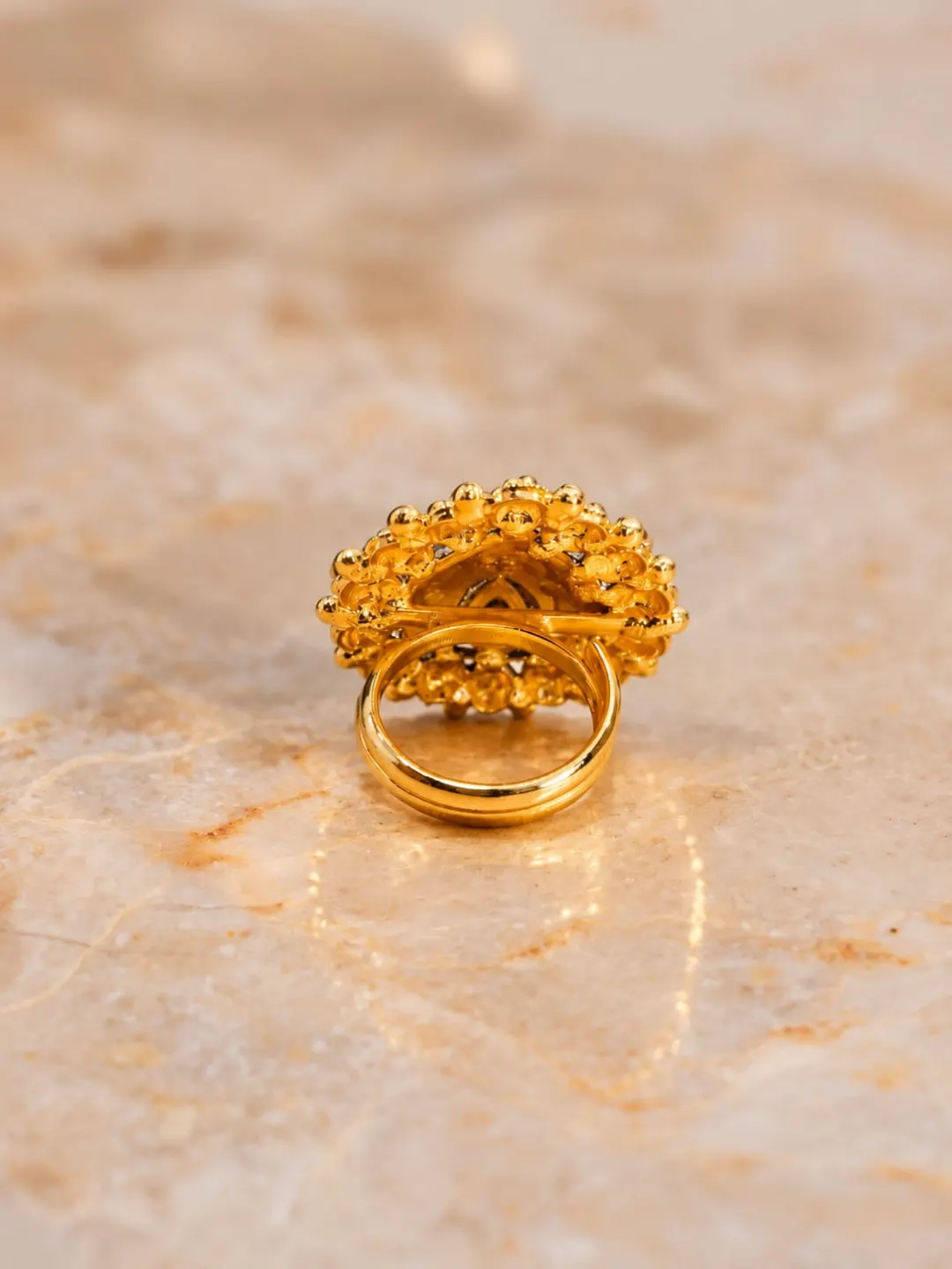 GOLD-TONE FLORAL RED STONE RING