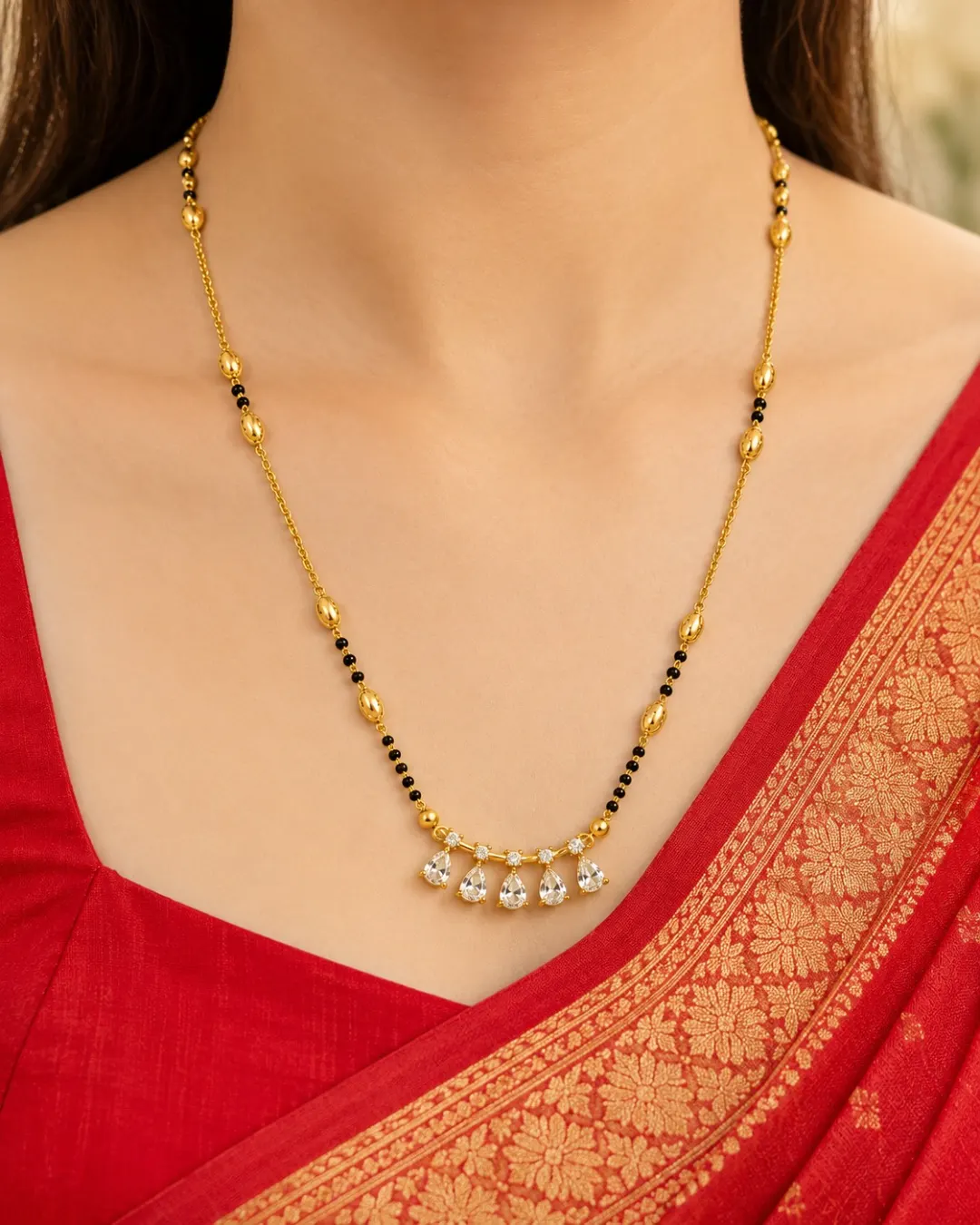 GOLD PLATEDFLORAL DROP MANGAKSUTRA NECKLACE.