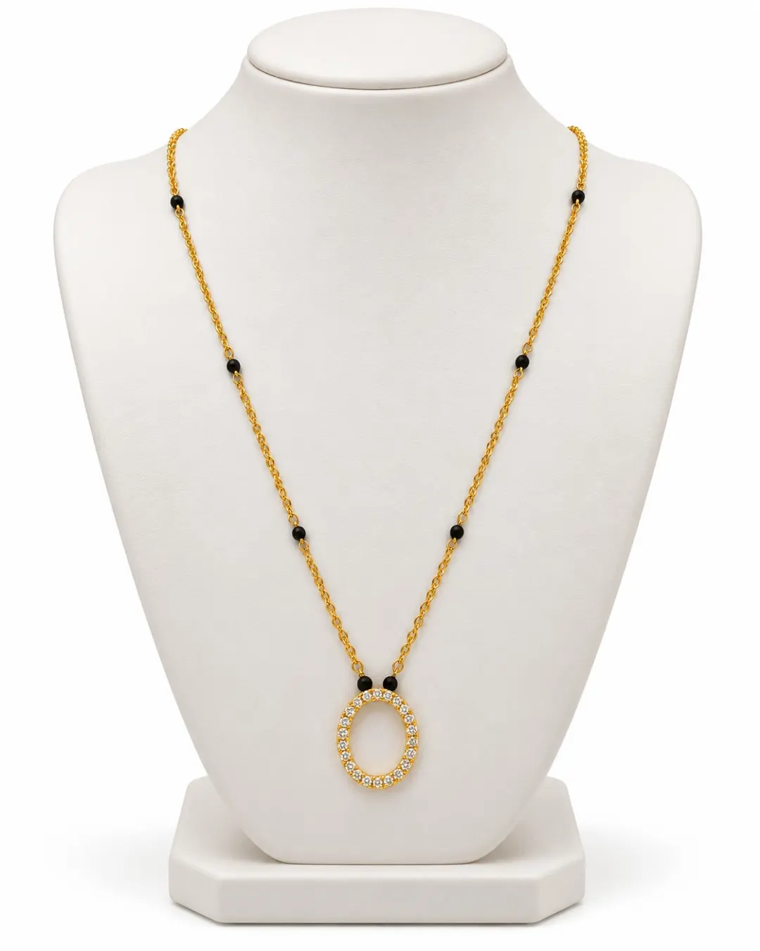 GOLD OVAL CRYSTAL PENDANT MANGALSUTRA NECKLACE.