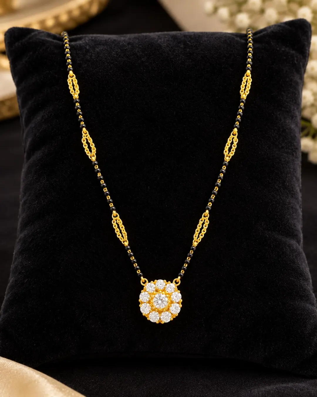 GOLD BLACK BEADED FLORAL MANGALSUTRA PENDANT NECKLACE.