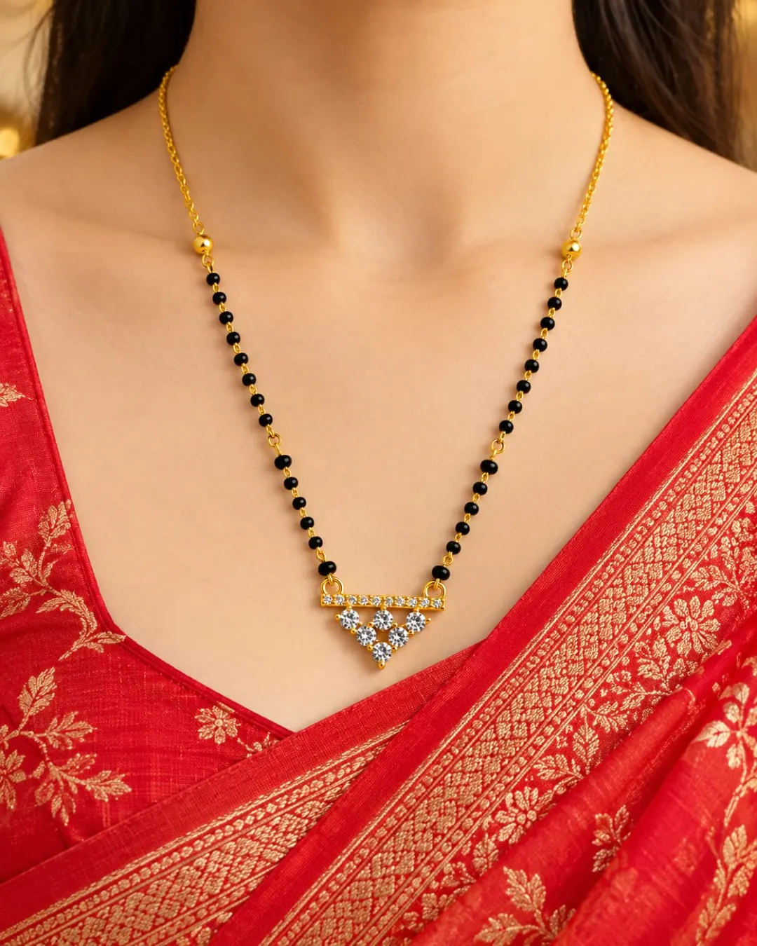 GOLD TRIANGLE DROP DIAMOND MANGALSUTRA .