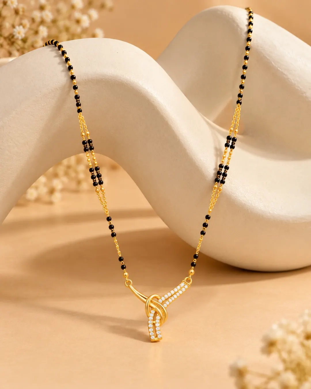 GOLD PLATED AMERICAN DIAMOND MANGALSUTRA WITH DESIGNER PENDANT