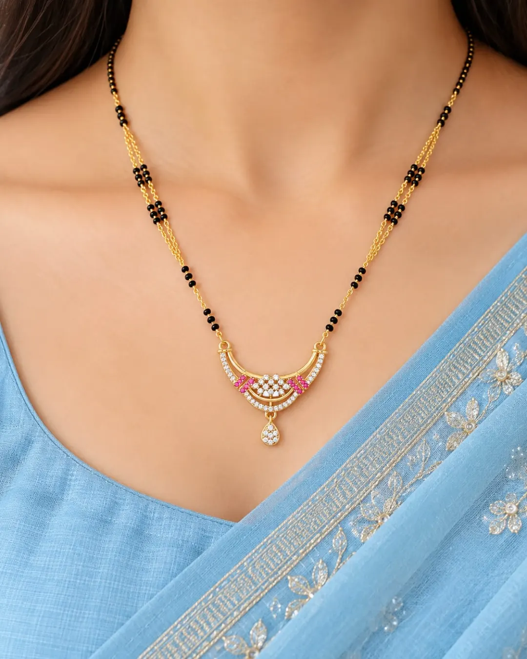 GOLD PLATED BLACK BEADS MANGALSUTRA WITH RUBY & AD STONE CRESCENT PENDANT.
