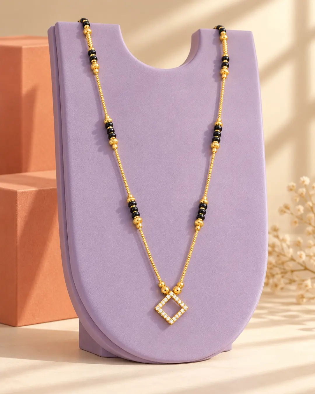 GOLD PLATED BLACK BEADS MANGALSUTRA DIAMOND SHAPED PENDANT